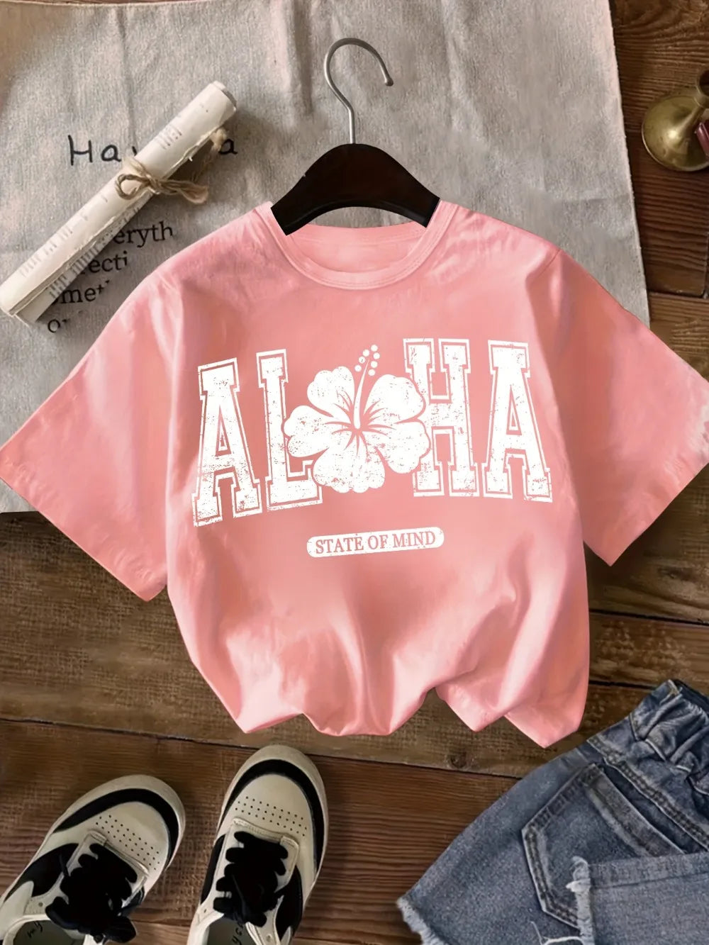 Aloha Hawaiian Greeting T-Shirt Featuring a Hibiscus Flower Design